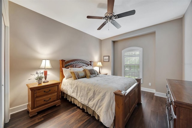 bedroom featuring dark wood-type flooring and ceiling fan