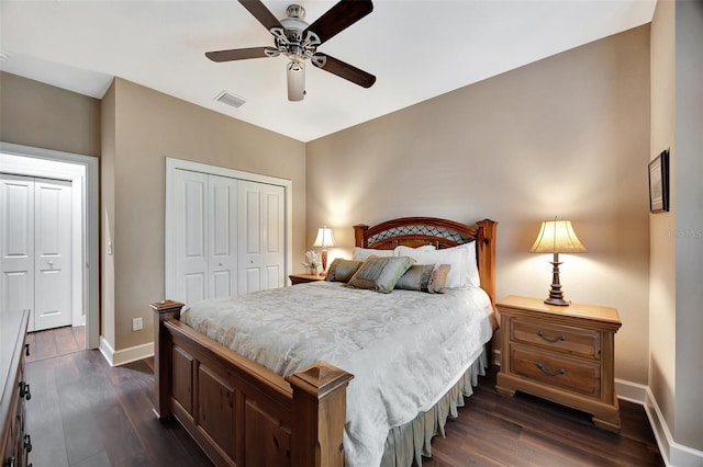 bedroom featuring dark hardwood / wood-style floors, ceiling fan, and a closet