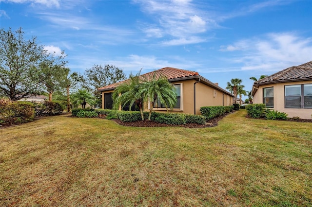 exterior space featuring a lawn