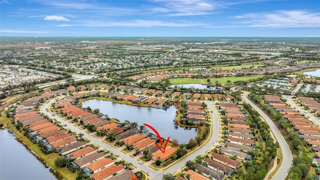 drone / aerial view featuring a water view