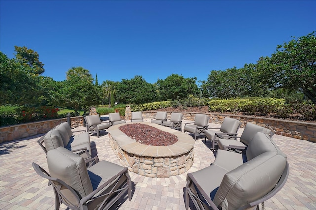 view of patio featuring an outdoor fire pit