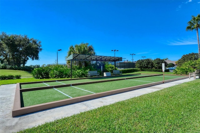 view of community with a lawn