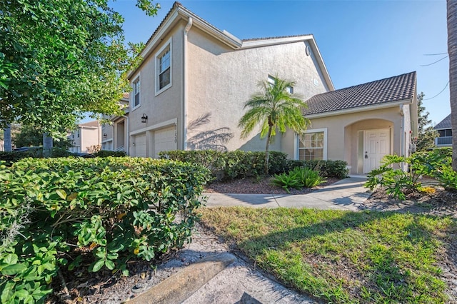 view of front of property featuring a garage