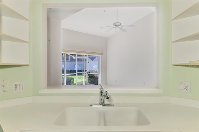 kitchen featuring sink and ceiling fan