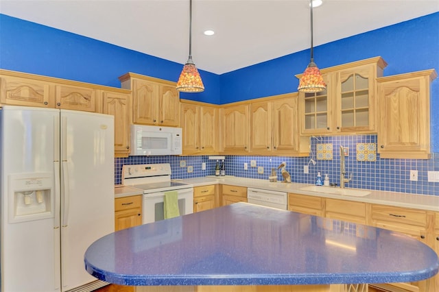 kitchen featuring sink, white appliances, decorative light fixtures, and light brown cabinets