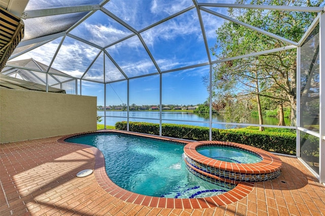 view of pool featuring a water view, an in ground hot tub, a patio, and a lanai