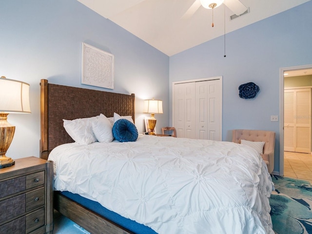 bedroom featuring a closet, vaulted ceiling, and ceiling fan