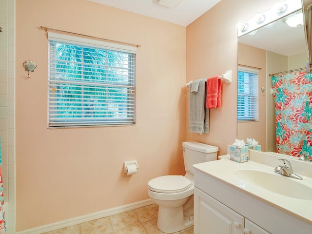 bathroom featuring vanity, toilet, walk in shower, and tile patterned flooring