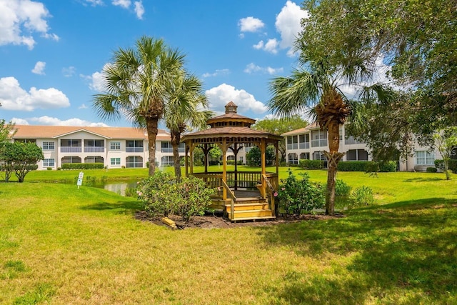 view of home's community with a gazebo and a lawn