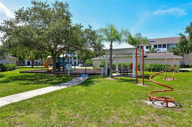 view of playground featuring a gazebo and a lawn