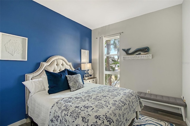 bedroom featuring hardwood / wood-style floors