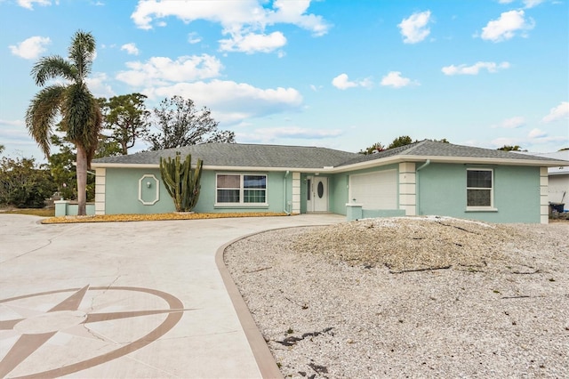 ranch-style home with a garage