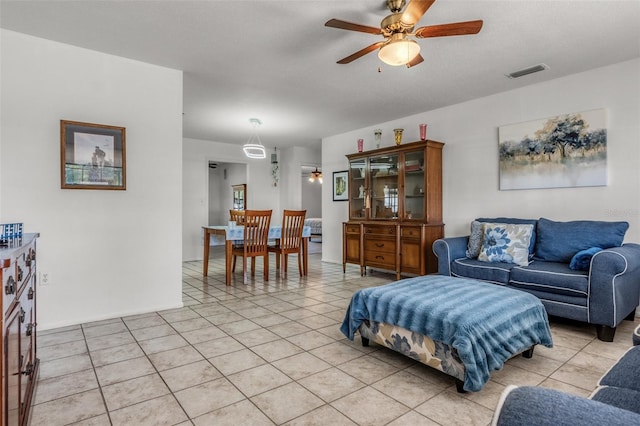 807 62nd St W, Bradenton, FL 34209 - living area featuring ceiling fan and light tile patterned floors