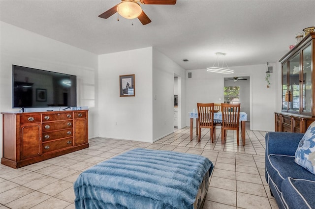 807 62nd St W, Bradenton, FL 34209 - living room featuring a ceiling fan and light tile patterned floors