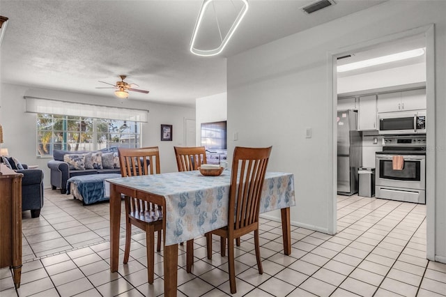 807 62nd St W, Bradenton, FL 34209 - dining space featuring a ceiling fan and light tile patterned flooring