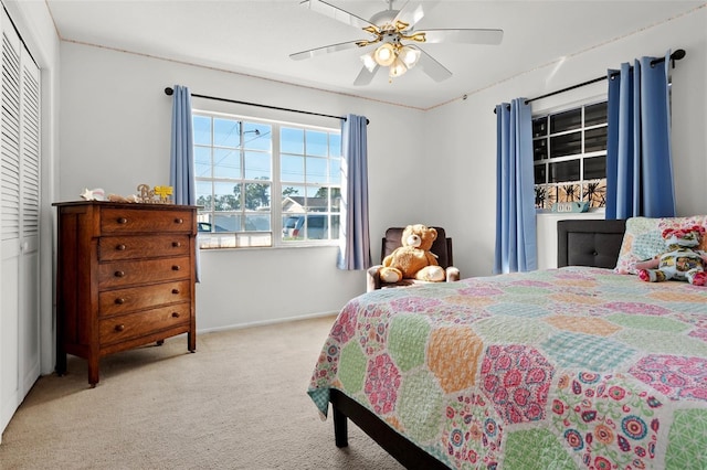 807 62nd St W, Bradenton, FL 34209 - carpeted bedroom with ceiling fan, a closet, and baseboards