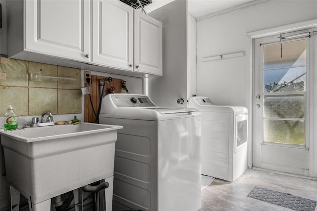 807 62nd St W, Bradenton, FL 34209 - laundry room with cabinet space and washing machine and clothes dryer