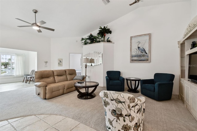 living room with ceiling fan, light colored carpet, and lofted ceiling