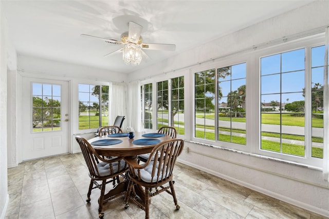 sunroom / solarium with ceiling fan