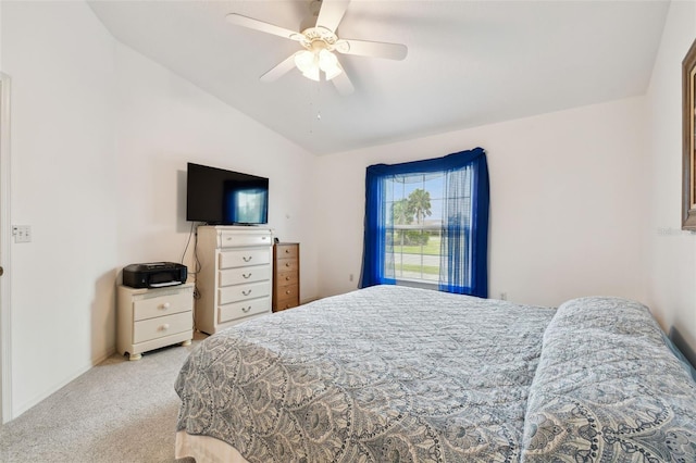 bedroom featuring ceiling fan, light carpet, and lofted ceiling