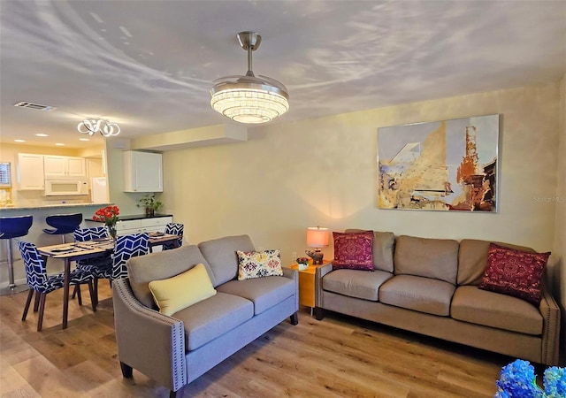 living room featuring light wood-type flooring