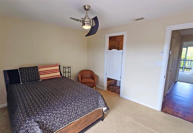 carpeted bedroom with access to outside and ceiling fan