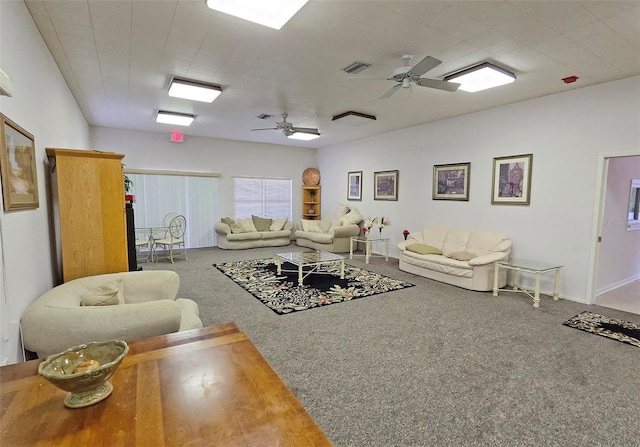 living room with carpet and ceiling fan