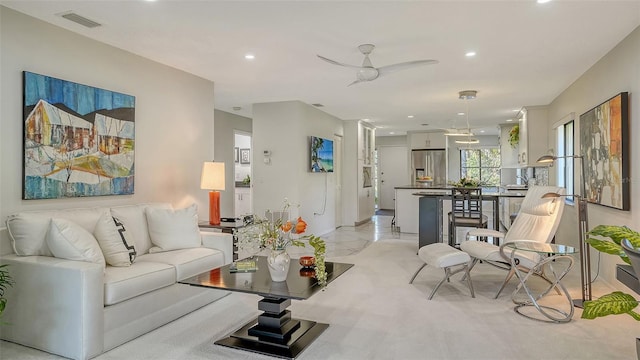 living room featuring ceiling fan