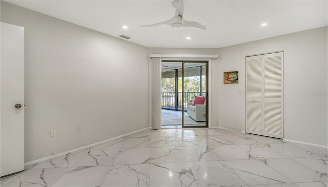 unfurnished bedroom featuring access to exterior, a closet, and ceiling fan