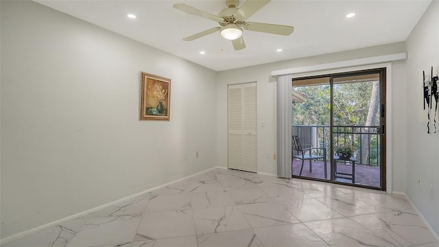 unfurnished room with ceiling fan