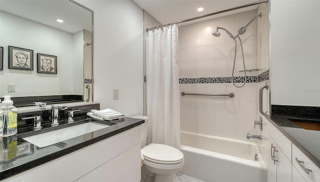 full bathroom with vanity, toilet, and shower / bath combo with shower curtain