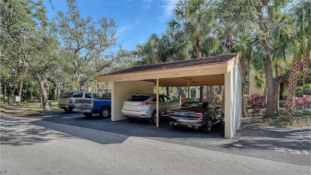 view of parking with a carport