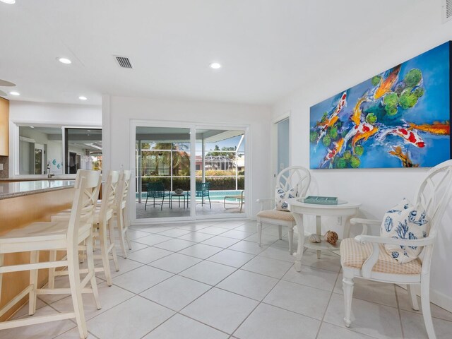 sitting room with light tile patterned floors