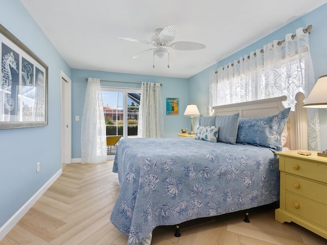 bedroom featuring light parquet flooring and ceiling fan