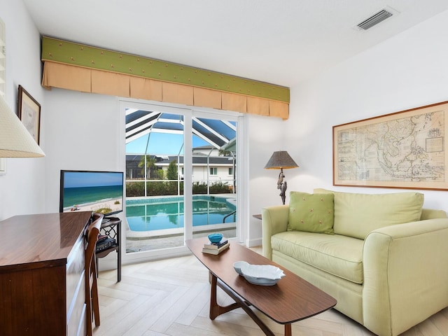 living room featuring light parquet floors