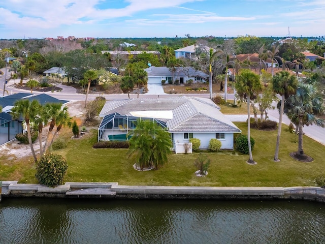 drone / aerial view with a water view