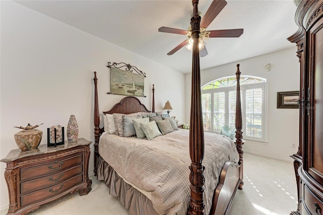 bedroom with ceiling fan and light colored carpet