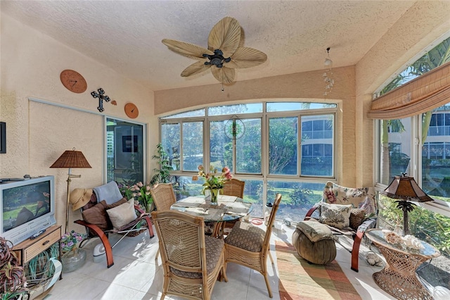 sunroom / solarium with ceiling fan