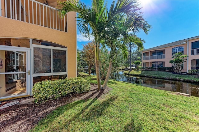 view of yard featuring a water view