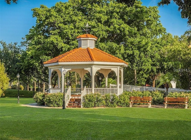 view of community with a yard and a gazebo