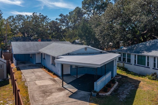 view of front of home with a carport