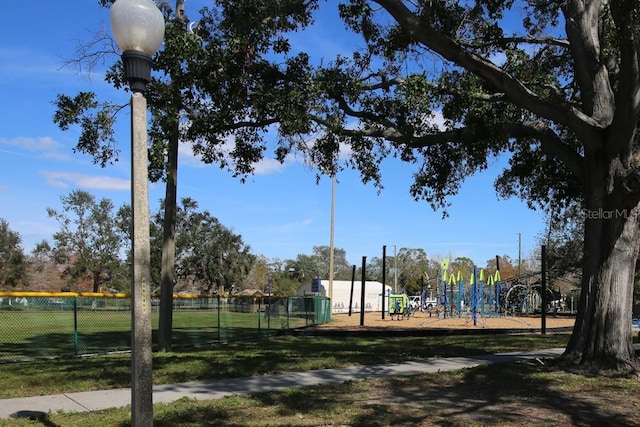 surrounding community featuring a playground