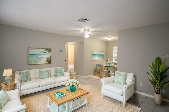 tiled living room featuring ceiling fan