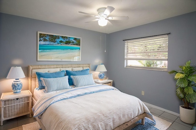 tiled bedroom with ceiling fan