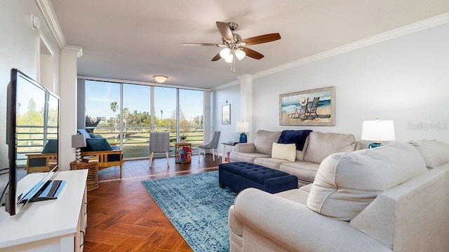 living room featuring crown molding, ceiling fan, dark parquet flooring, and a wall of windows