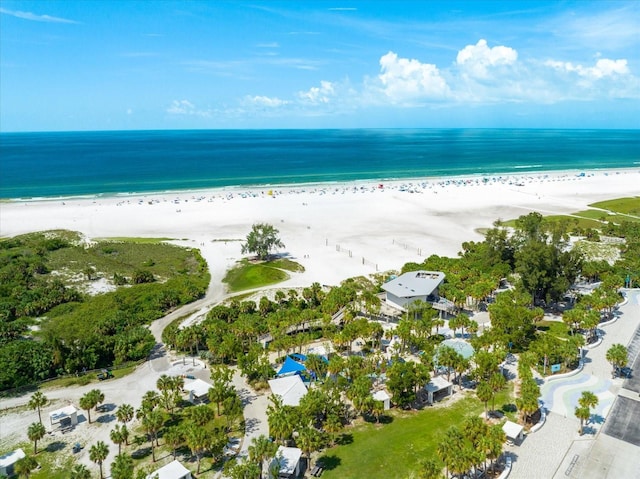 drone / aerial view featuring a view of the beach and a water view