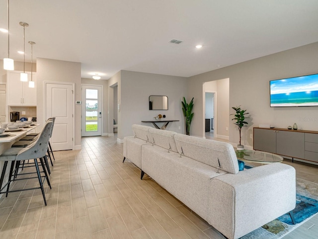 living room featuring light wood-type flooring