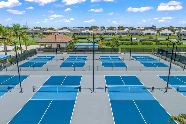 view of tennis court featuring a gazebo