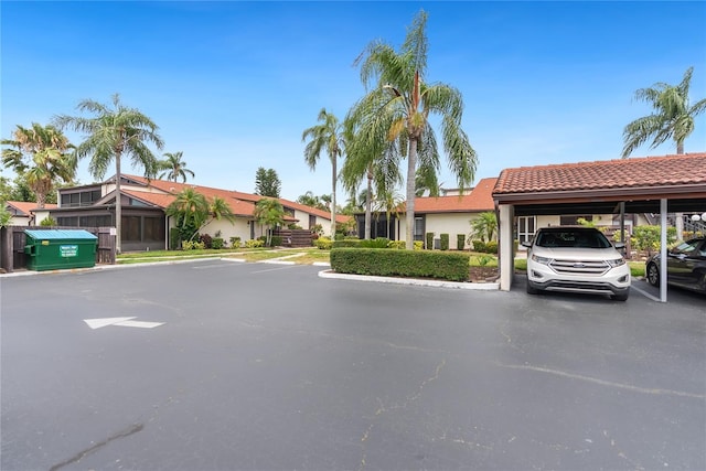 exterior space featuring a carport