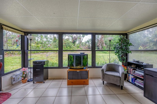 sunroom with a paneled ceiling